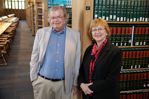 two people standing in the Law Library