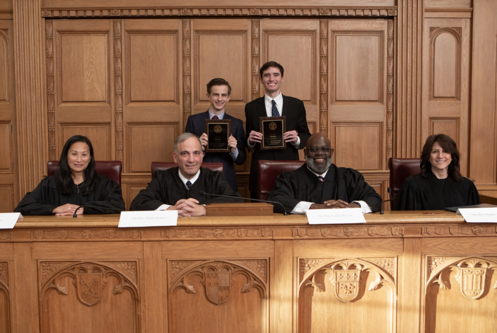 Pictured in the back from left to right: Andrew Hallowell '26 and Paul Janes '26. Pictured in the front from left to right: Hon. Tana Lin., Hon. Joseph Bianco, Hon. Carlton Reeves, and Hon. Ronnie Abrams. 